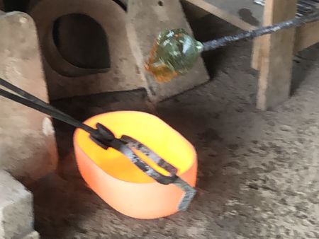 Removing pots on the final day before shutting down the furnace (Photo © Fiona Rashleigh)