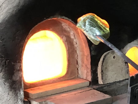 Removing pots on the final day before shutting down the furnace (Photo © Fiona Rashleigh)