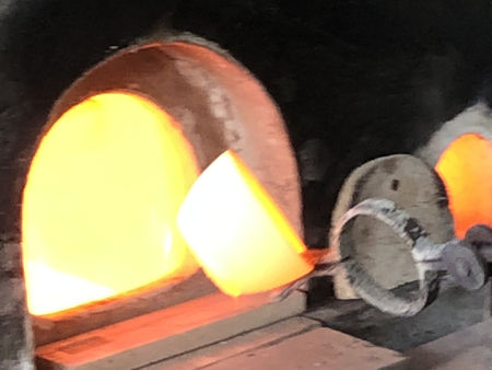 Removing pots on the final day before shutting down the furnace (Photo © Fiona Rashleigh)