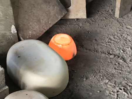 Removing pots on the final day before shutting down the furnace (Photo © Fiona Rashleigh)