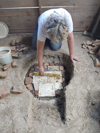 Tracey working on the firepit