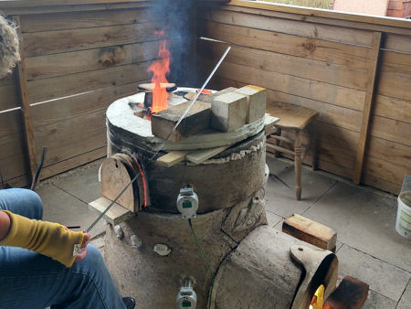 Beadmaking, with the furnace at about 1100°C